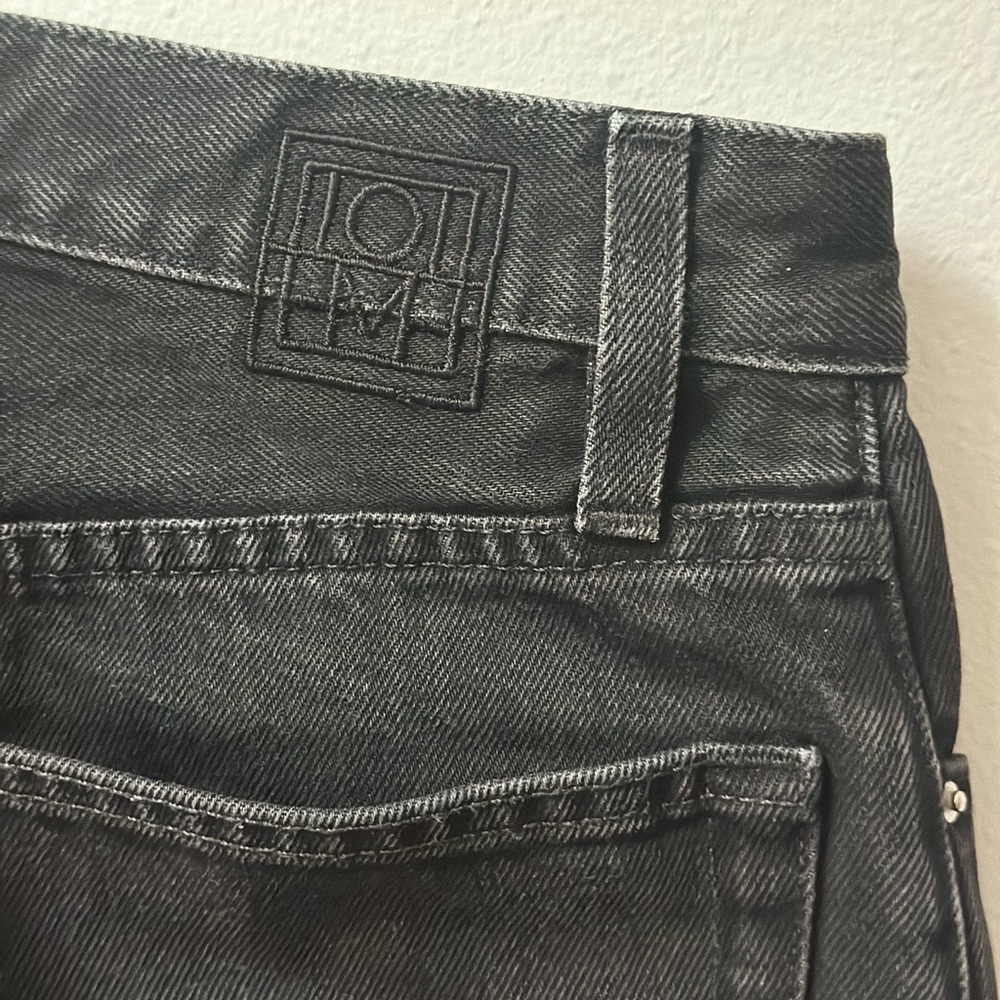 TOTEME Black Cropped Kick Denim Jeans
